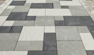 Pose de carrelage sur une terrasse en grès cérame sur plot au Bois d'Oingt
